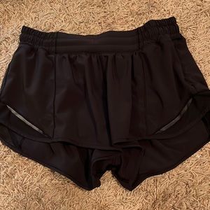 Black lululemon hotty hot 2.5” shorts.